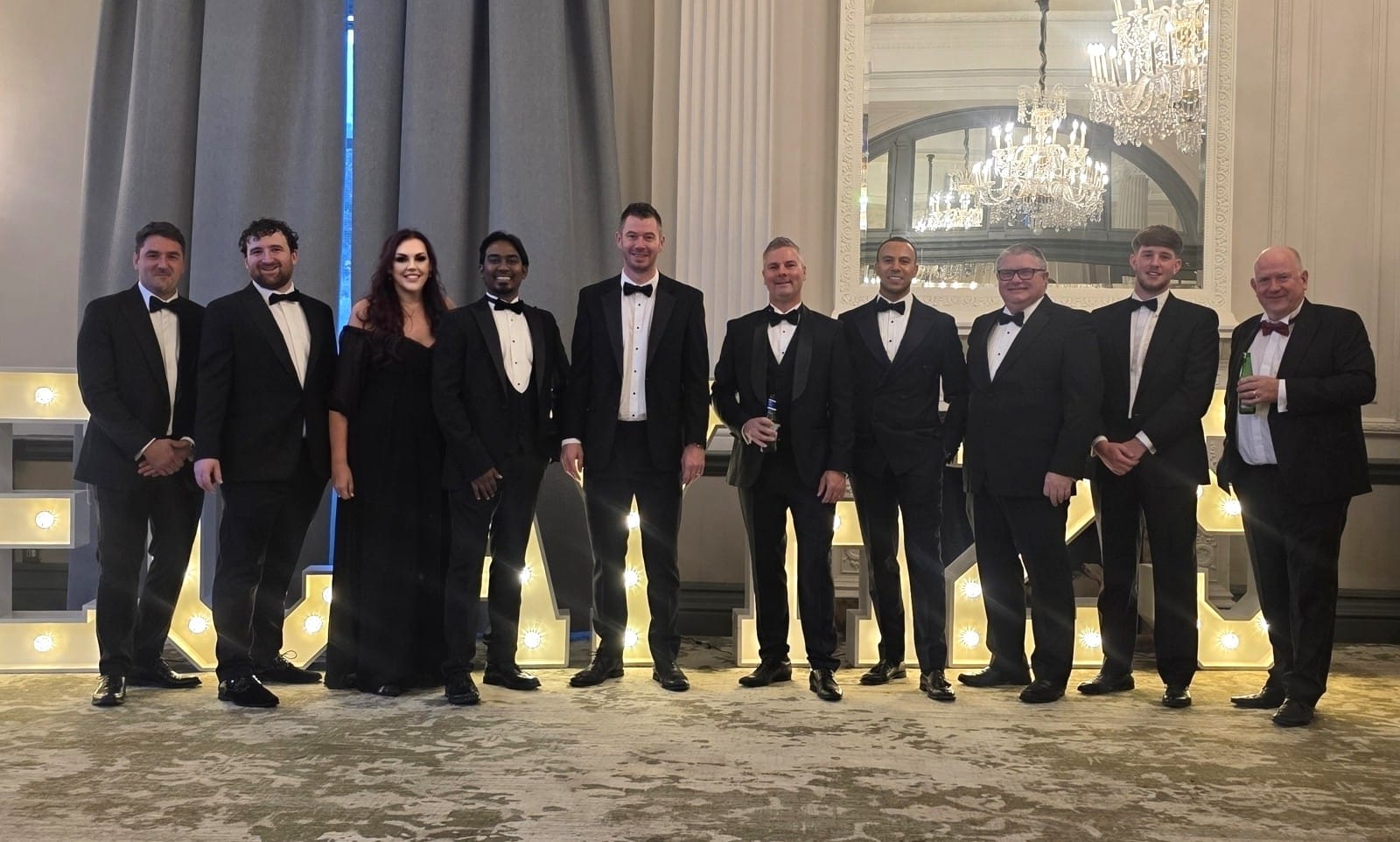 CECA Dinner 2025 with team, About Cairn Cross Team Photo